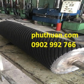 Gia công đắp trục cao su 